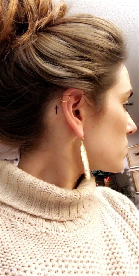 back of ear tattoo|cross behind ear tattoo female.